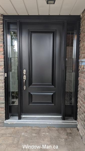 Black door. Solid core door.  Executive panels. Sidelights. Santa Fe glass